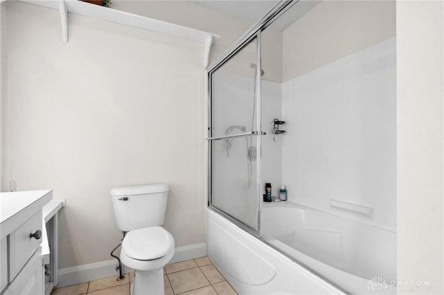 full bathroom featuring vanity, tile patterned flooring, toilet, and enclosed tub / shower combo