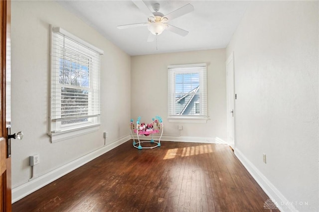 interior space with hardwood / wood-style flooring and ceiling fan