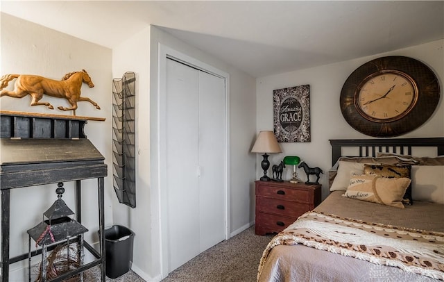 bedroom with a closet and carpet flooring