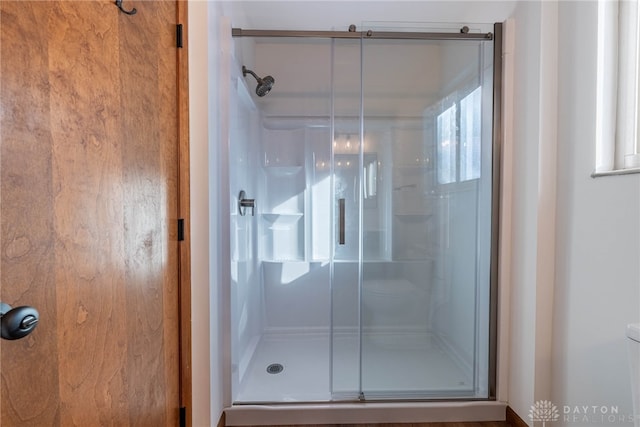 bathroom with an enclosed shower