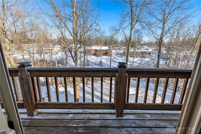 view of snow covered deck