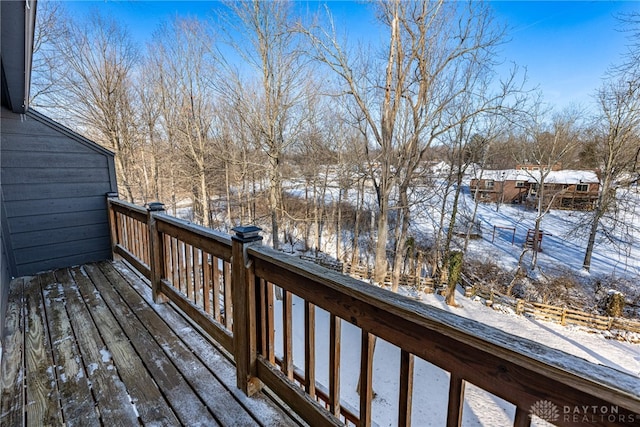 view of snow covered deck