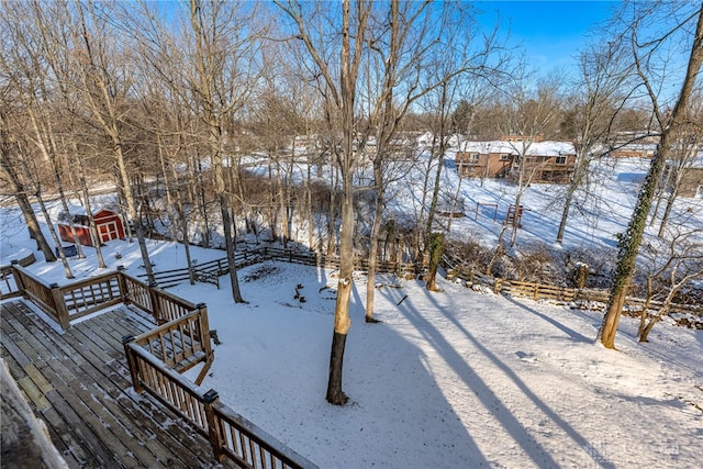 view of yard layered in snow