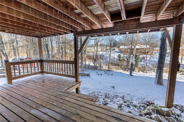 view of snow covered deck