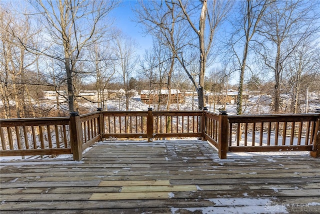 view of snow covered deck