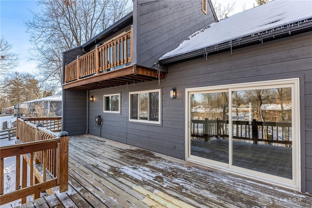 view of snow covered deck