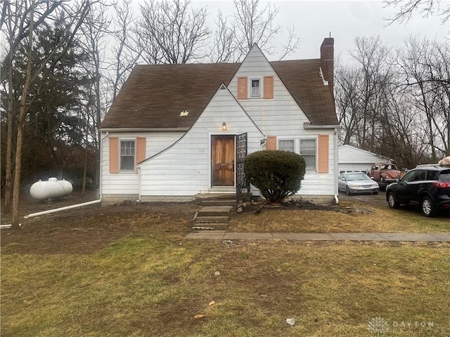 view of front of home with a front lawn