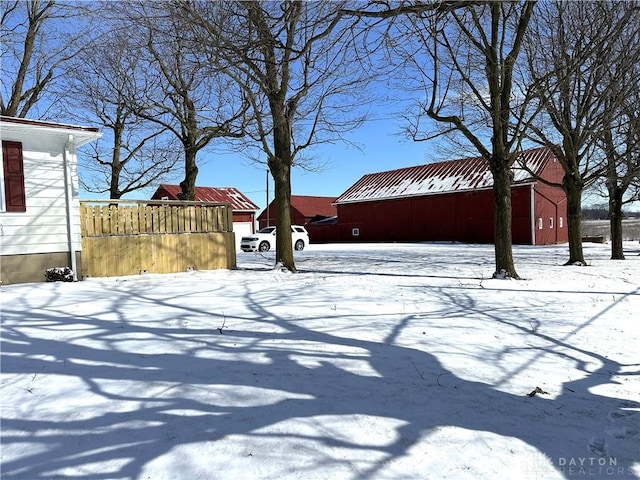 view of yard layered in snow