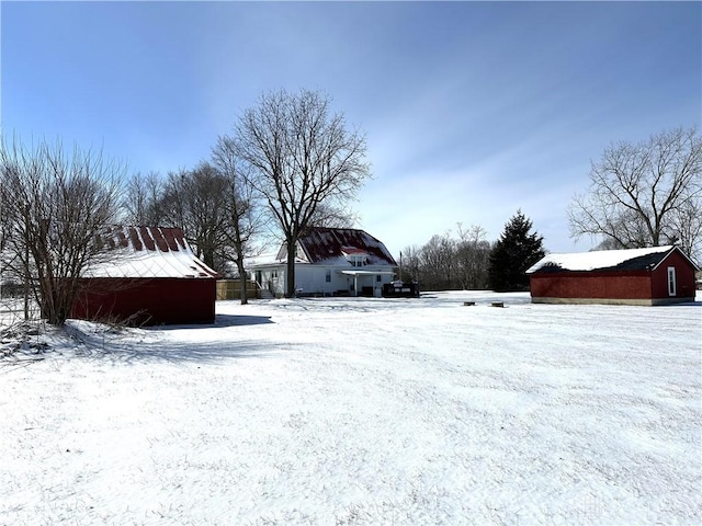 view of yard covered in snow