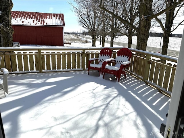 view of snow covered deck