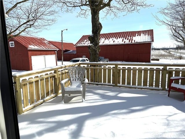 view of snow covered deck