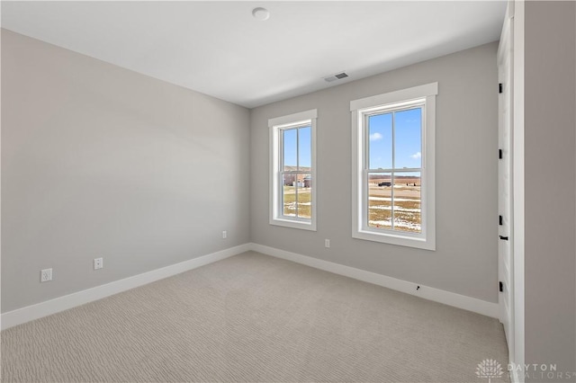 empty room with light carpet