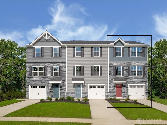 5124 Brentwood Dr, Huber Heights, OH 45424 - view of front facade featuring stone siding, driveway, and a front lawn