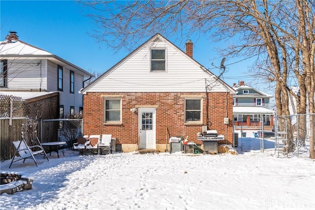 view of snow covered house