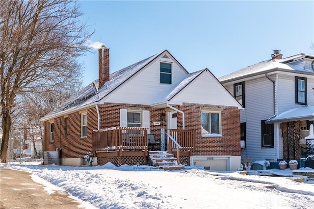 view of front of house featuring a deck and central AC unit