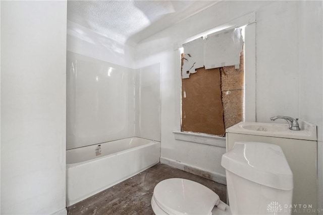 bathroom with toilet and a textured ceiling