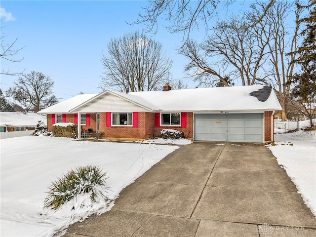 single story home featuring a garage