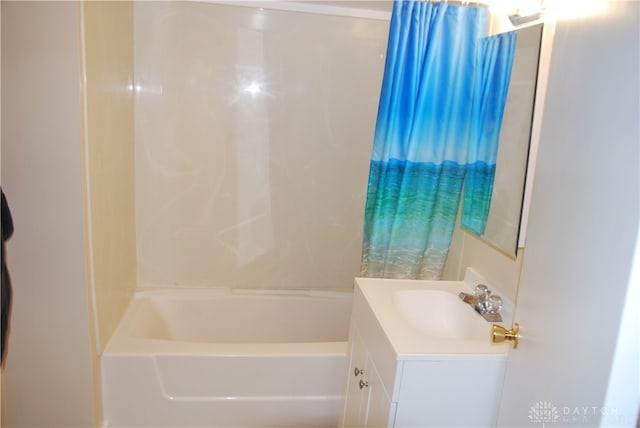 bathroom with vanity and shower / tub combo