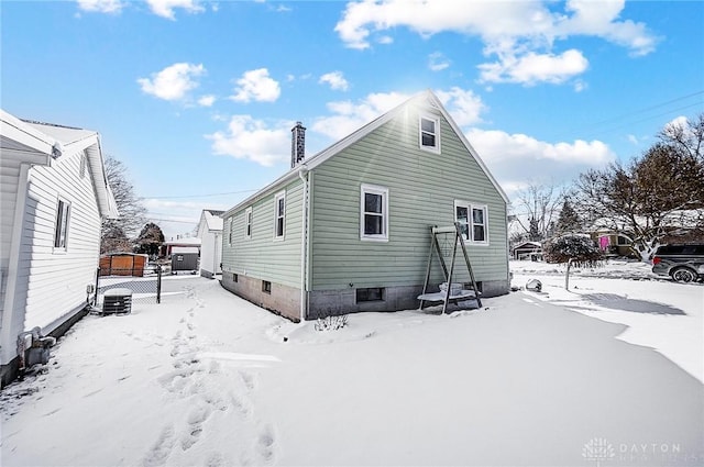 view of snow covered house