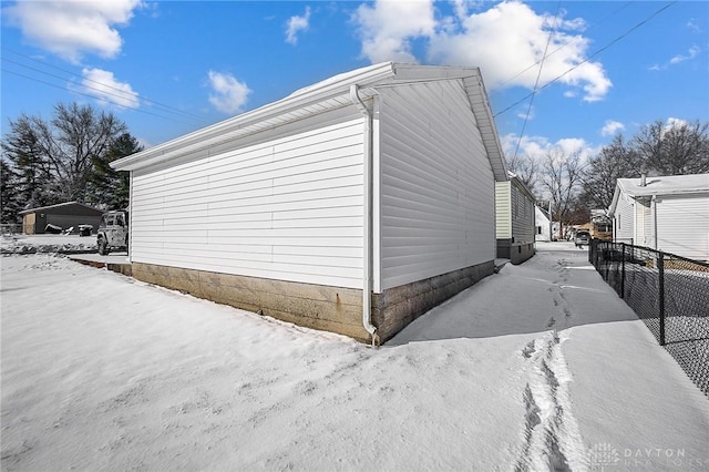 view of snow covered property