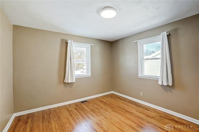 empty room featuring light hardwood / wood-style floors