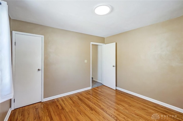 unfurnished bedroom with light hardwood / wood-style floors