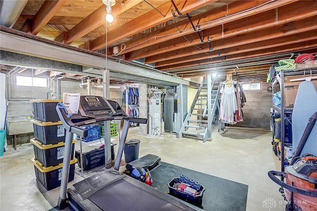 exercise area featuring gas water heater