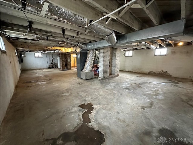 basement featuring heating unit