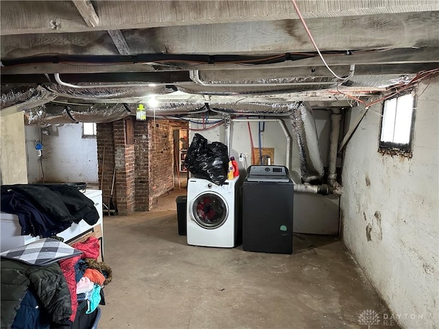 basement with washing machine and dryer