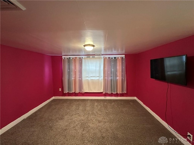 empty room featuring carpet flooring