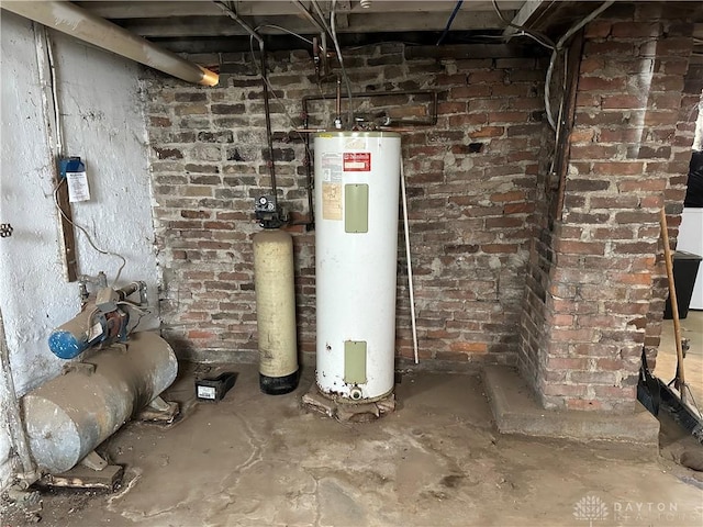 utility room with electric water heater