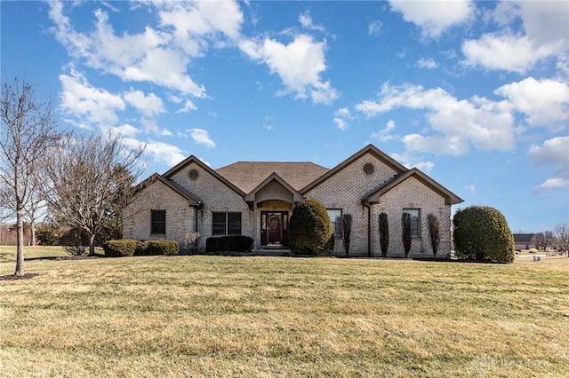 french country style house featuring a front lawn