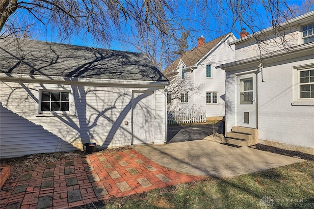 view of side of home featuring a patio area