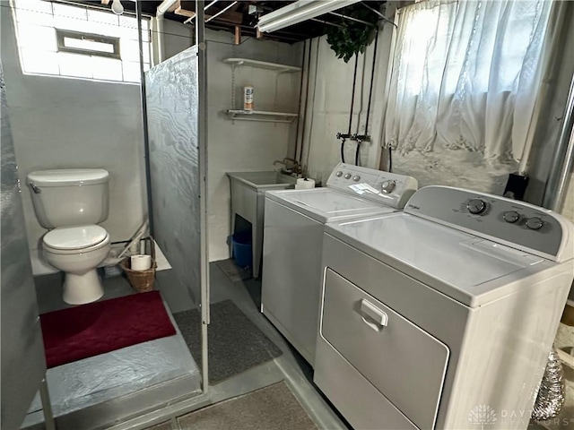 laundry room with separate washer and dryer