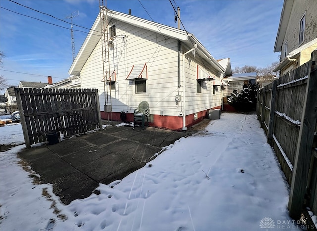 view of snow covered property