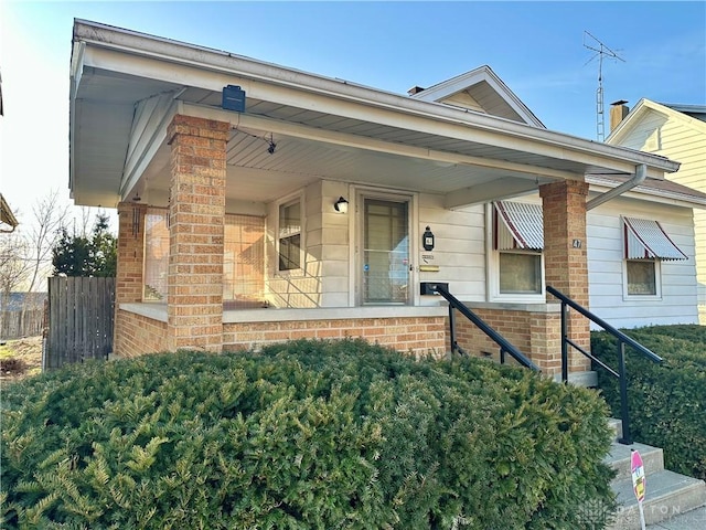 view of front of home with brick siding