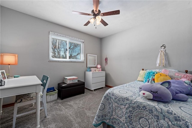 carpeted bedroom with a ceiling fan and baseboards