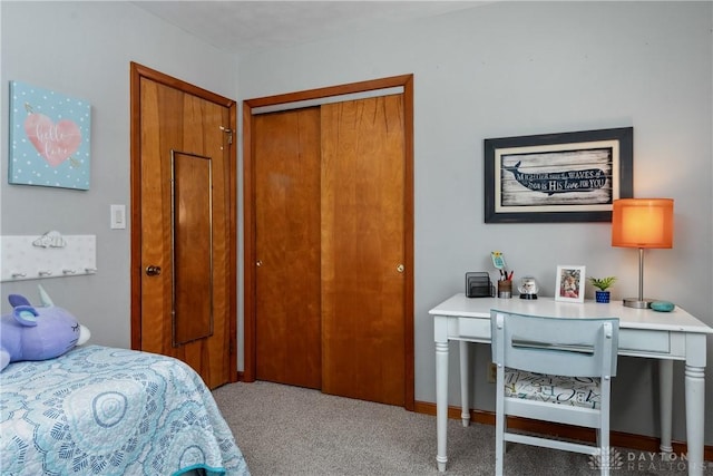 carpeted bedroom with a closet