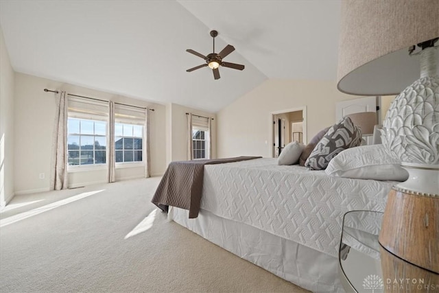 carpeted bedroom with lofted ceiling and ceiling fan