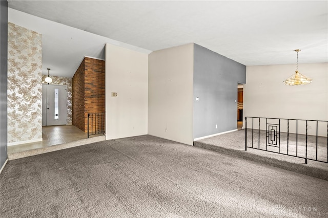 unfurnished living room with carpet