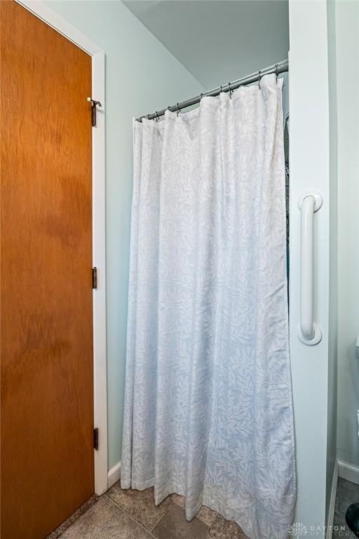 bathroom featuring baseboards