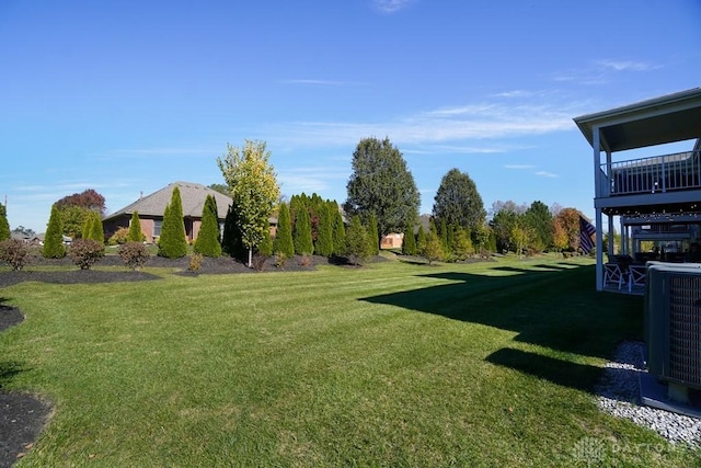 view of yard featuring central AC unit