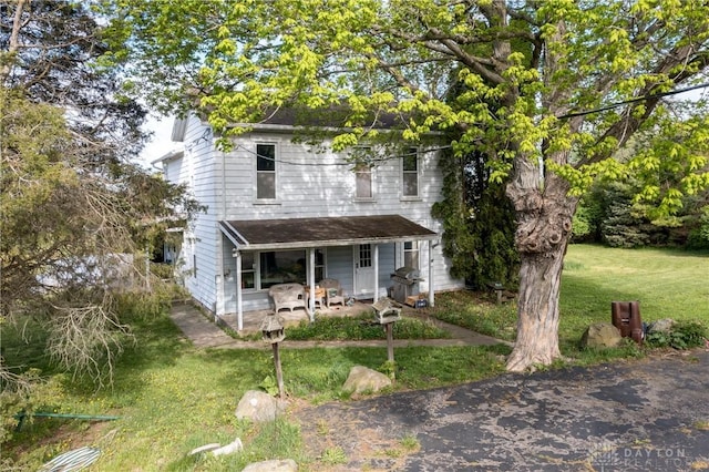 5400 S Iddings Rd, West Milton, OH 45383 - view of front of property with a front yard and a patio area