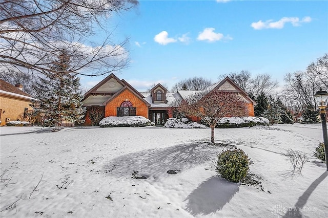 view of front of home with brick siding