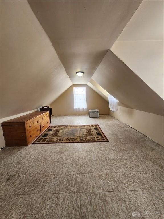 bonus room with lofted ceiling