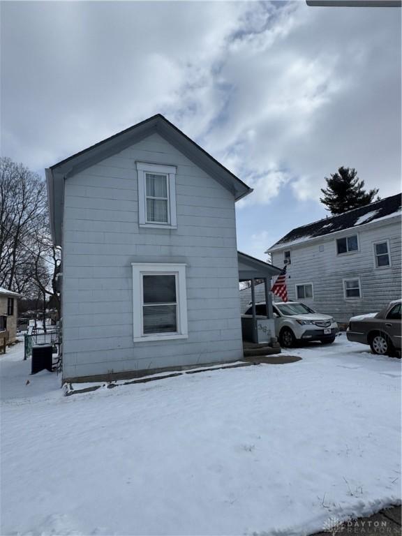 view of snow covered property