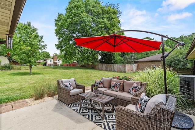 view of patio with fence and an outdoor hangout area