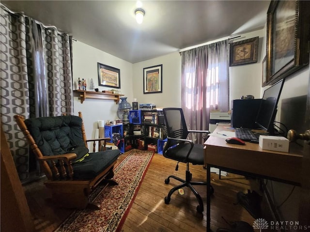 office space with wood finished floors