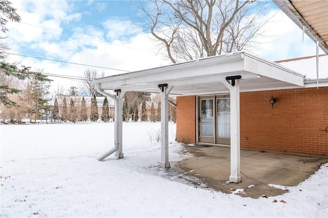 view of snow covered patio