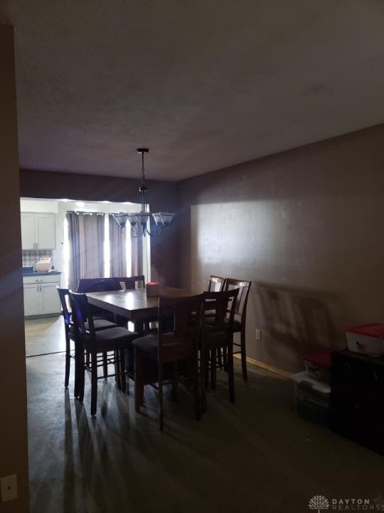 dining room with a chandelier